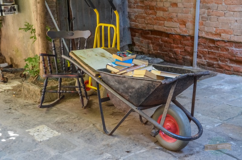 Libreria Acqua Alta Bookshop in Venice Italy has a whole array of unusual bookshelves to look through including this wheelbarrow. If you notice, they have also positioned a rocking chair carefully nearby just in case you fancy sitting down to read on of your new finds.