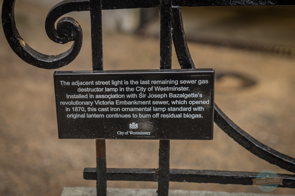 Plaque beside the gas sewage lamp in London down Carting Lane by the Savoy