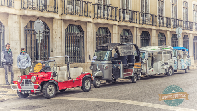 Black tuk-tuk waiting in lisbon portugal