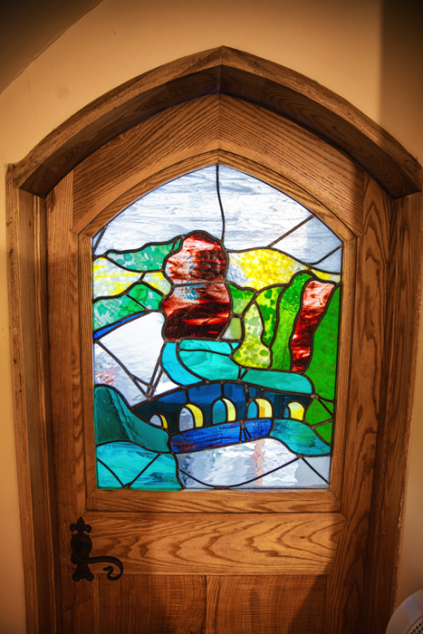Stained glass windows are featured throughout Pod Hollow at West Stow Pods.