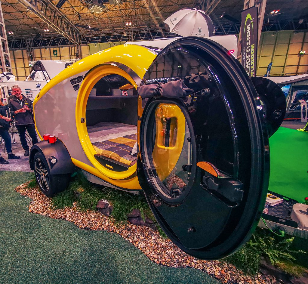Small, towing pod , similar to a caravan on offer at the NEC in Brimingham