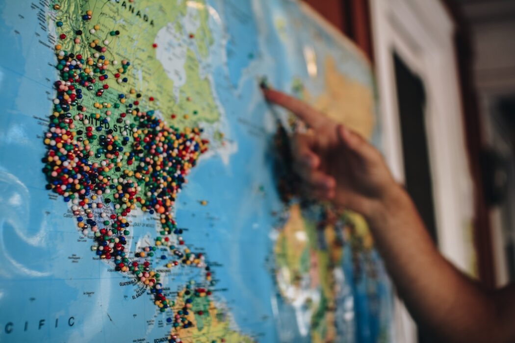 Map of the world highlighting location with pins specifically around South America