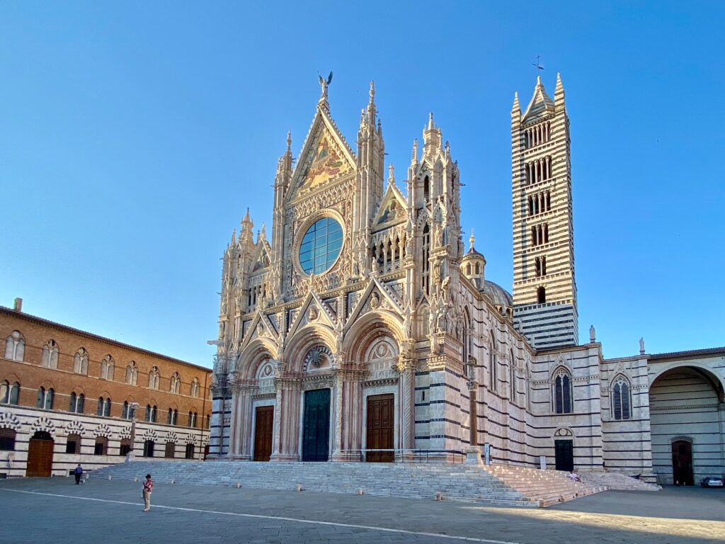 The Black and White Cathedral of Siena is very similar to the Duomo in Florence, Tuscany, Italy