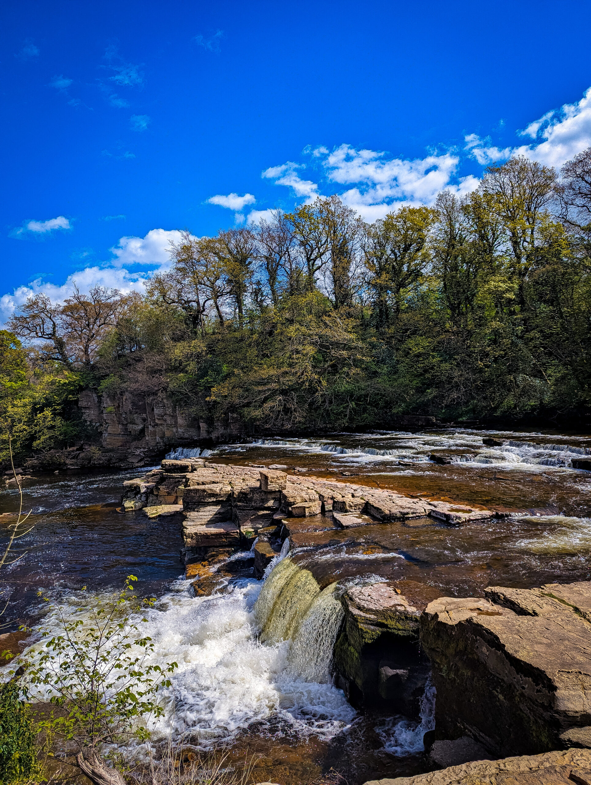 The Richmond Water falls across the River Swale in North Yorkshire