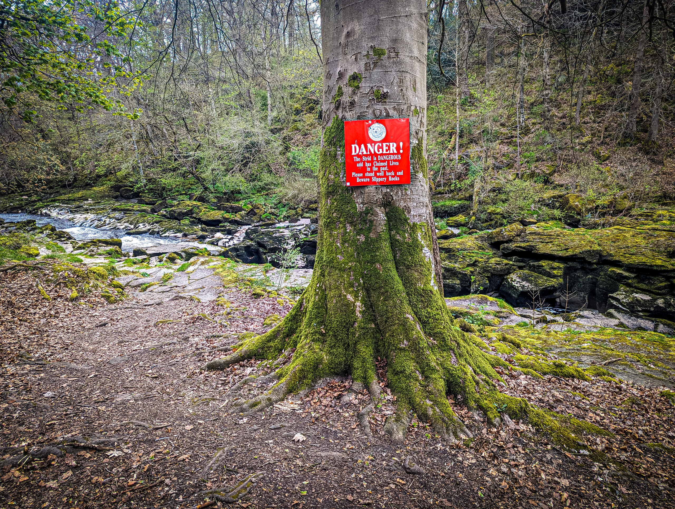 The danger sign by the Strid at Bolton Abbey in North Yorkshire