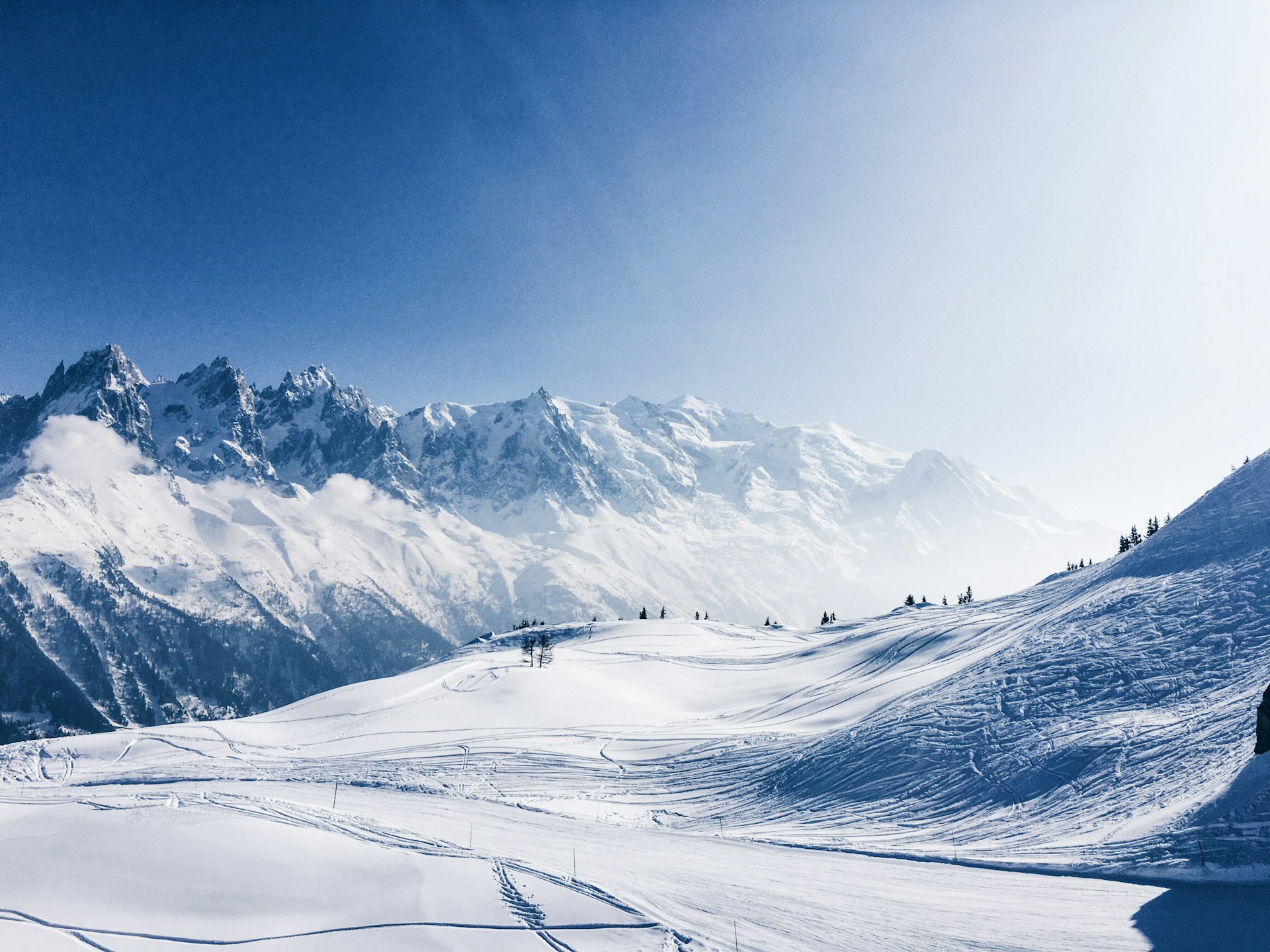 Ski resort with a valley and mountains all around.